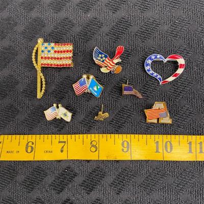 Various American flag pins