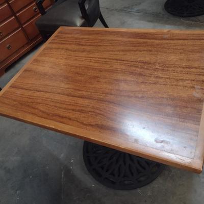 Pair of Commercial Grade Solid Wood Top with Cast Metal Pedestal Tables