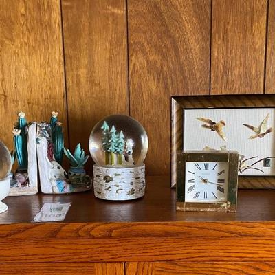 Lot of decorative items including snow globes