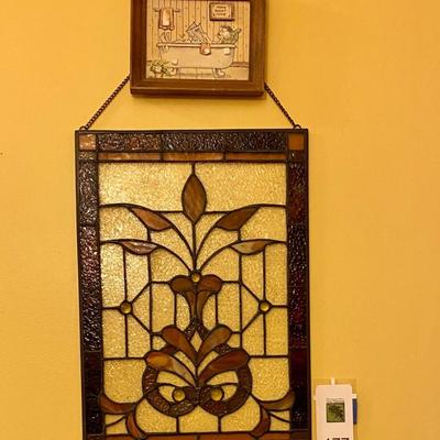 Stained glass window and small bathroom picture