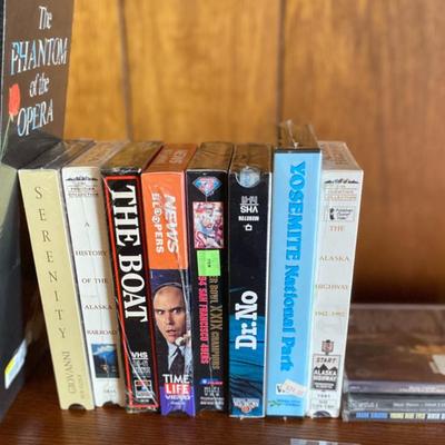 Lot of unopened CDs and video tapes
