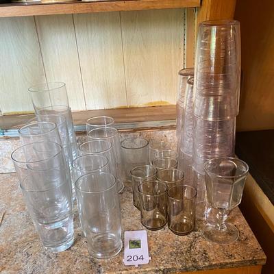 Large lot of various glass and plastic cups