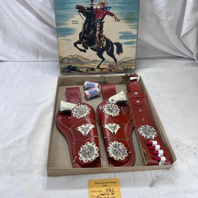 Carnell MFG 1940s Child's  Texas Junior Cowboy Round Up 2 cap Guns with red  leather belt and Holsters
