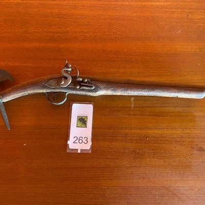 Antique axe and pistol
