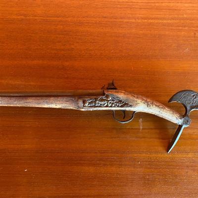 Antique axe and pistol
