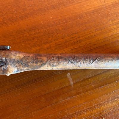 Antique axe and pistol