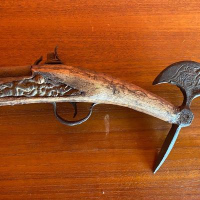 Antique axe and pistol