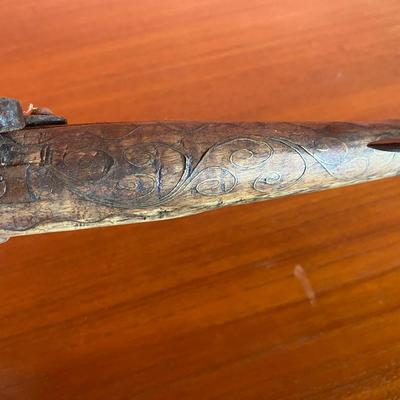 Antique axe and pistol