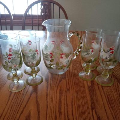 STEMMED ROOSTER GLASSES AND A MATCHING PITCHER