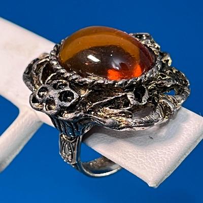 HEFTY AMBER COLORED CABUCHON RING