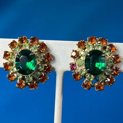 VINTAGE PRONG SET RED, CLEAR RHINESTONES SURROUNDING GREEN CTR.