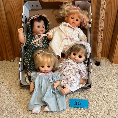 Lot of 4 newer dolls.