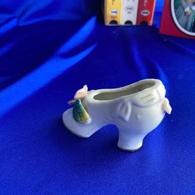 QUEEN ANNE OIL LAMP, VHS MOVIES WITH INNOCENCE AND A VINTAGE HIGH HEEL