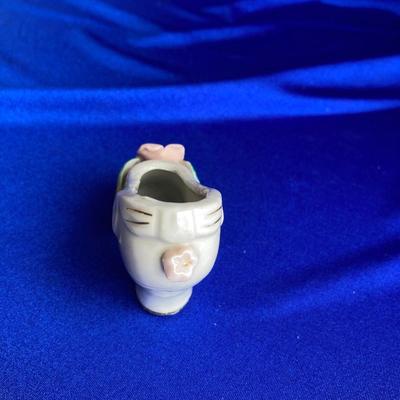 QUEEN ANNE OIL LAMP, VHS MOVIES WITH INNOCENCE AND A VINTAGE HIGH HEEL