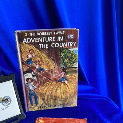 NORMAN ROCKWELL PORCELAIN DOLL, CUTE LITTLE FLOWER POT BABY, VINTAGE BOOKS AND MORE! ðŸ’¥