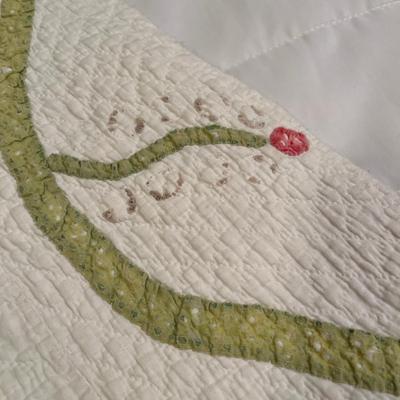 Machine done floral quilt