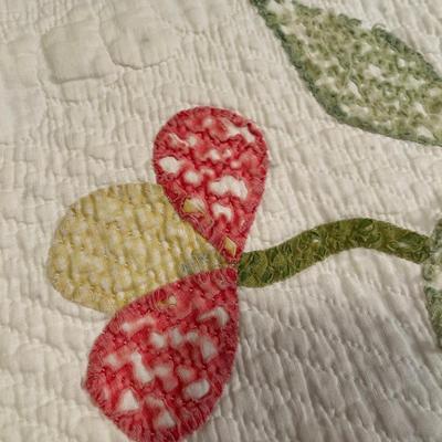 Machine done floral quilt