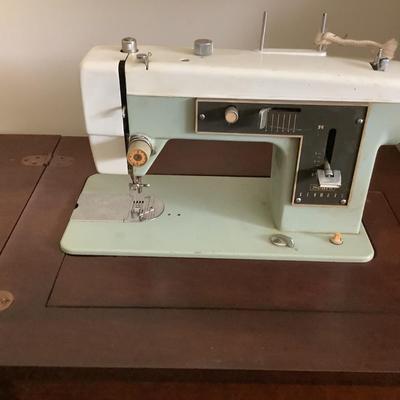 Side table that happens to have a sewing machine -Sears Kenmore in it 30"H 22" x 18" depth