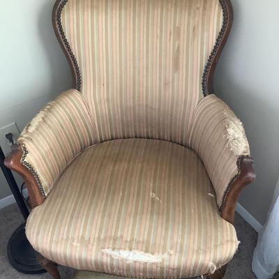 Stripped chair with wood frame and good bones 36"H 27"W 20"depth