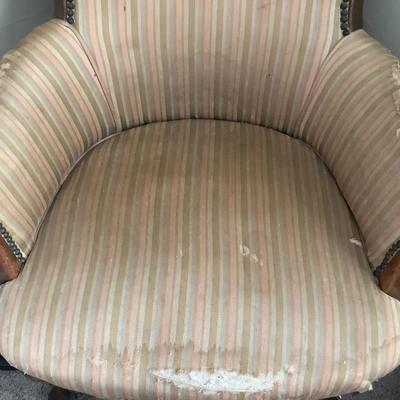 Stripped chair with wood frame and good bones 36"H 27"W 20"depth
