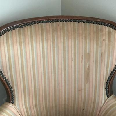 Stripped chair with wood frame and good bones 36"H 27"W 20"depth