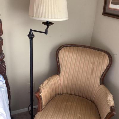 Stripped chair with wood frame and good bones 36"H 27"W 20"depth