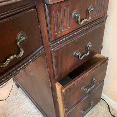 Mahoganey desk -1940s, 8 drawers, 2 pull out writing trays with great detail & hardware pulls, 30.5"H 48"W 25"depth