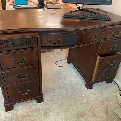 Mahoganey desk -1940s, 8 drawers, 2 pull out writing trays with great detail & hardware pulls, 30.5"H 48"W 25"depth