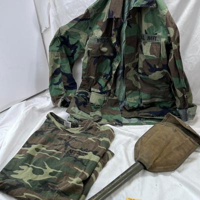 Camouflage Army jacket  M-L marked "Woods"  Folding camp shovel in canvas holder.
