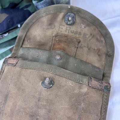 Camouflage Army jacket  M-L marked "Woods"  Folding camp shovel in canvas holder.
