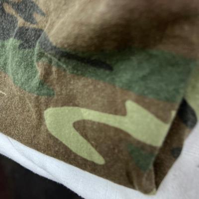 Camouflage Army jacket  M-L marked "Woods"  Folding camp shovel in canvas holder.
