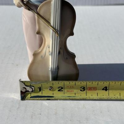NAO Girl playing instrument