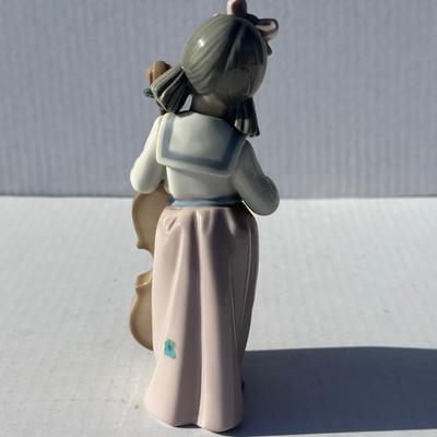 NAO Girl playing instrument