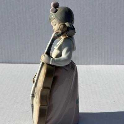 NAO Girl playing instrument