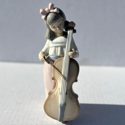 NAO Girl playing instrument