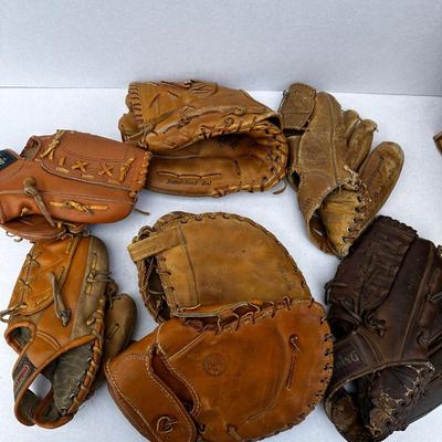Lot of vintage Baseball and softball gloves