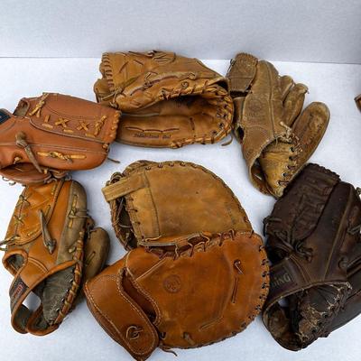 Lot of vintage Baseball and softball gloves