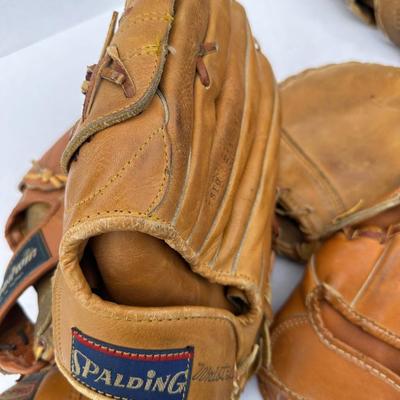 Lot of vintage Baseball and softball gloves