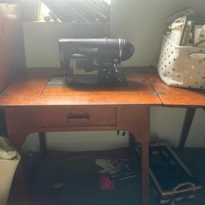 Kenmore sewing machine and mid century cabinet