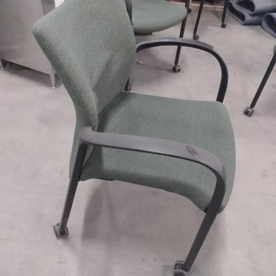 Set of Four Cushioned Rolling Office Chairs