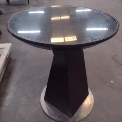 Single Contemporary Round Top Side Table with Glass Top and Metal Plate Base Wood Post