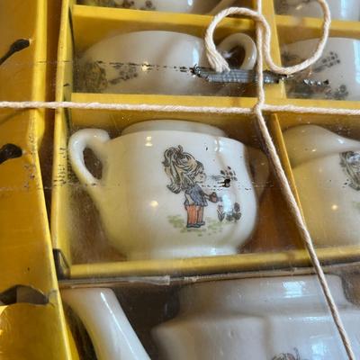 Lot of 2 vintage delux tea sets.