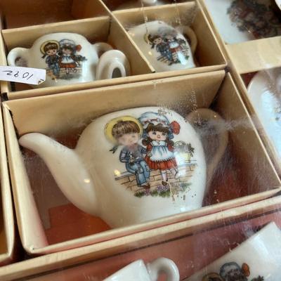 Lot of 2 vintage delux tea sets.