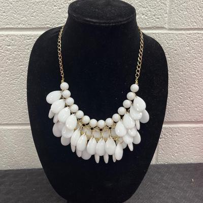 white and gold tone statement necklace