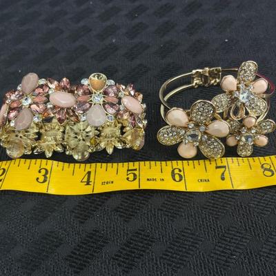 Gold tone pink floral enamel bracelets