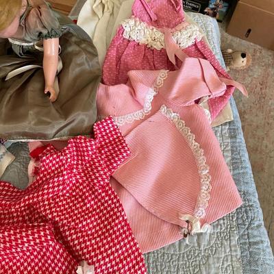 MEDIUM VINTAGE DOLL WITH CLOTHES