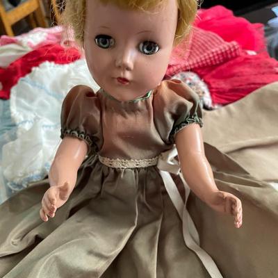 MEDIUM VINTAGE DOLL WITH CLOTHES