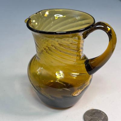 SMALL AMBER BLOWN GLASS PITCHER WITH SWIRLS 