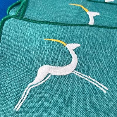 SET OF 4 LINEN MCM EMROIDERED STYLIZED IBEX NAPKINS