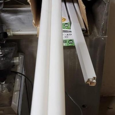 Electric heater & 2 cases of florescent light bulbs